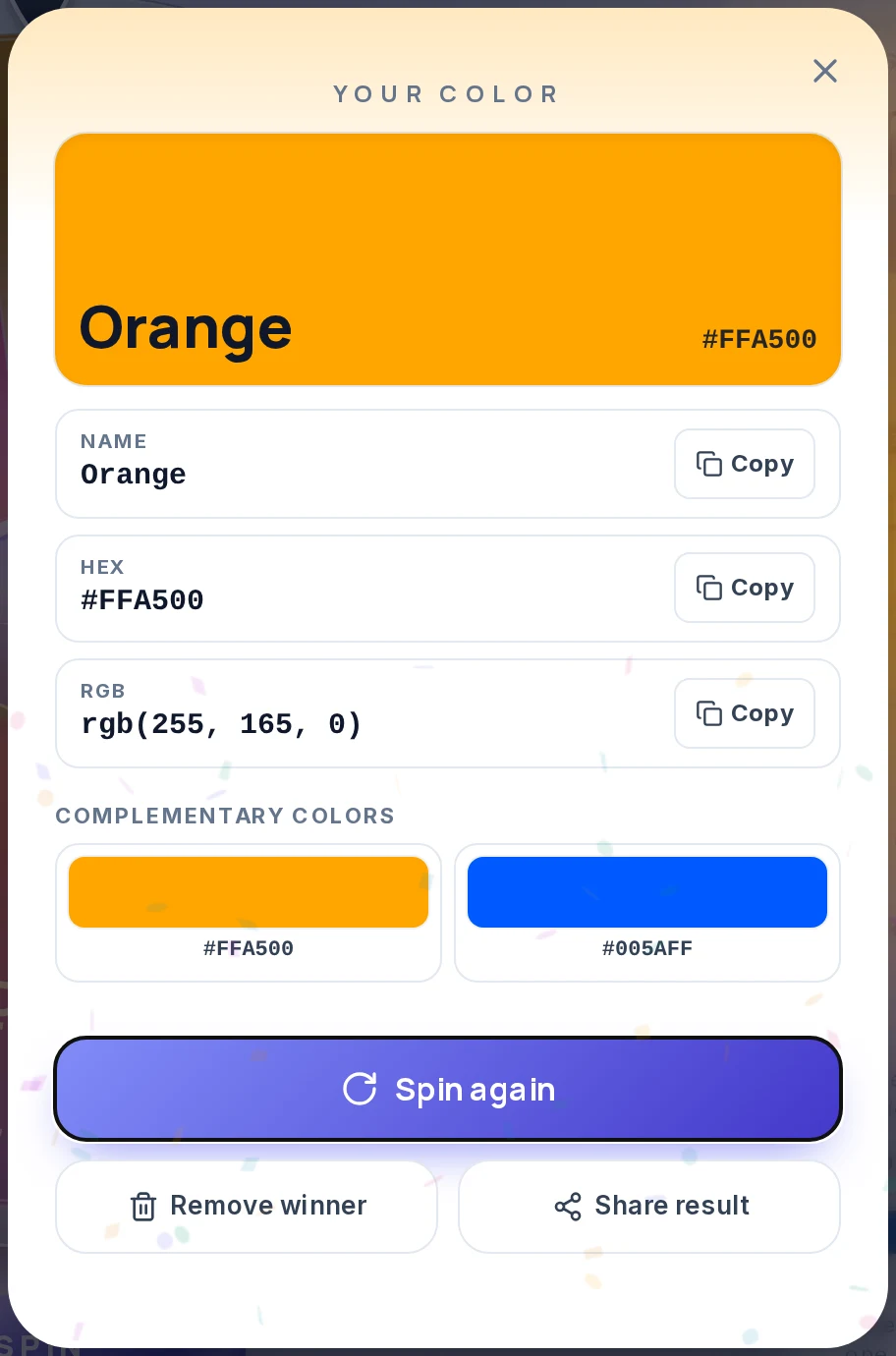 Result card on the color picker wheel for Orange, with a large orange swatch, Name, HEX #FFA500 and RGB rgb(255, 165, 0) rows each with a Copy button, two complementary color swatches, and Spin again, Remove winner and Share result buttons.